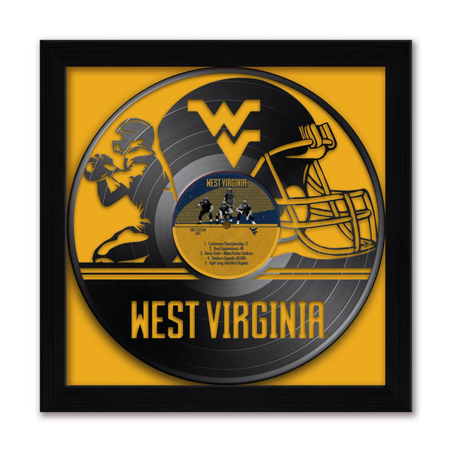 4 W  
WEST VIRGINIA  
1 LEON  
Cordorama Championship  
National Appomattox  
4 1  
Hore Fald- Mim Pka  
Stadium E  
Stadium Eapacity 300 5  
"ght Smng ful Med  
WEST VIRGINIA  

FIRST SEASON  
1915  

1. Conference: Big Ten  
2. Bowl: Orange Bowl  
3. Home Stadium: Mountaineer Field  
4. Stadium Capacity: 60,000  
5. Fight Song: "Mountaineer Pride"  

Championships: 15  
Home Stadium: Mountaineer Field  
Capacity: 60,000  
Fight Song: "Mountaineer Pride"  
West Virginia