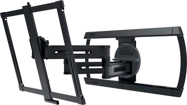 The image features a black TV stand with a flat screen TV mounted on it. The TV stand is designed to hold the TV securely and provide a stable base. The stand is made of metal and has a sleek, modern appearance. The TV is positioned in the center of the stand, making it the focal point of the room. The stand is likely made by the brand Sanus, known for its high-quality TV stands and mounts.