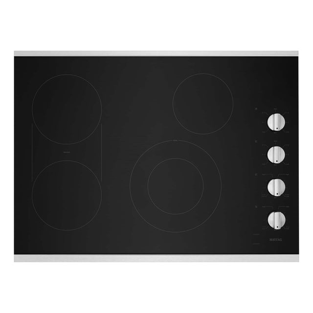 Left. Maytag - 30 inch Wide 4 element Electric Cooktop with Reversible Grill and Griddle and Die-cast Metal Knobs - Stainless Steel.