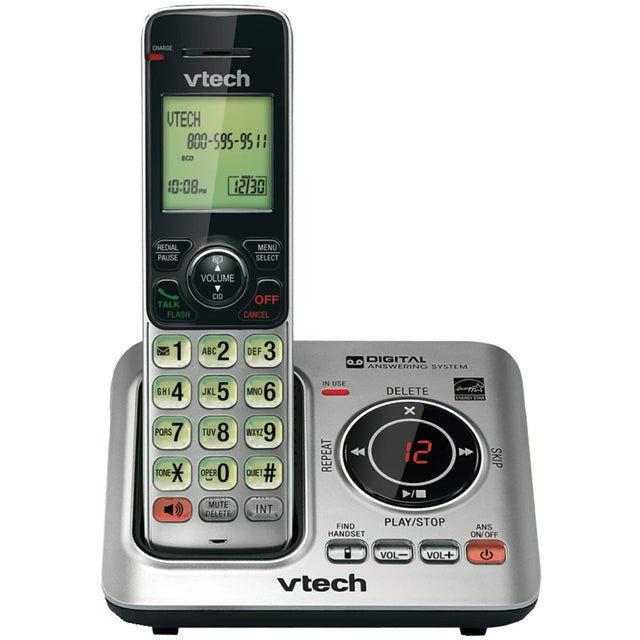 CHARGE  
vtech  
UTECH  
800-595-95 11  
ECO  
10:08 PM 12/30  
REDIAL PAUSE MENU SELECT VOLUME TALK FLASH CID OFF CANCEL  
1 GHI 4 PORS 7 TONE ABC 2 JKL 5 TUV 8 OPER 0 DEF 3 MNO 6 WIYZ 9 QUIET # 0  
DIGITAL ANSWERING SYSTEM IN USE DELETE p ENGT FAA x REPEAT 12 SKIP MUTE DELETE INT FIND PLAY/STOP HANDSET ANS ON/OFF VOL- VOL++  
vtech